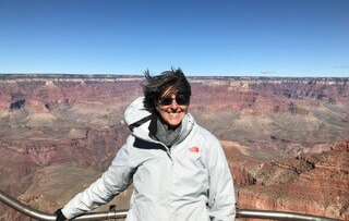 woman standing at Grand Canyon