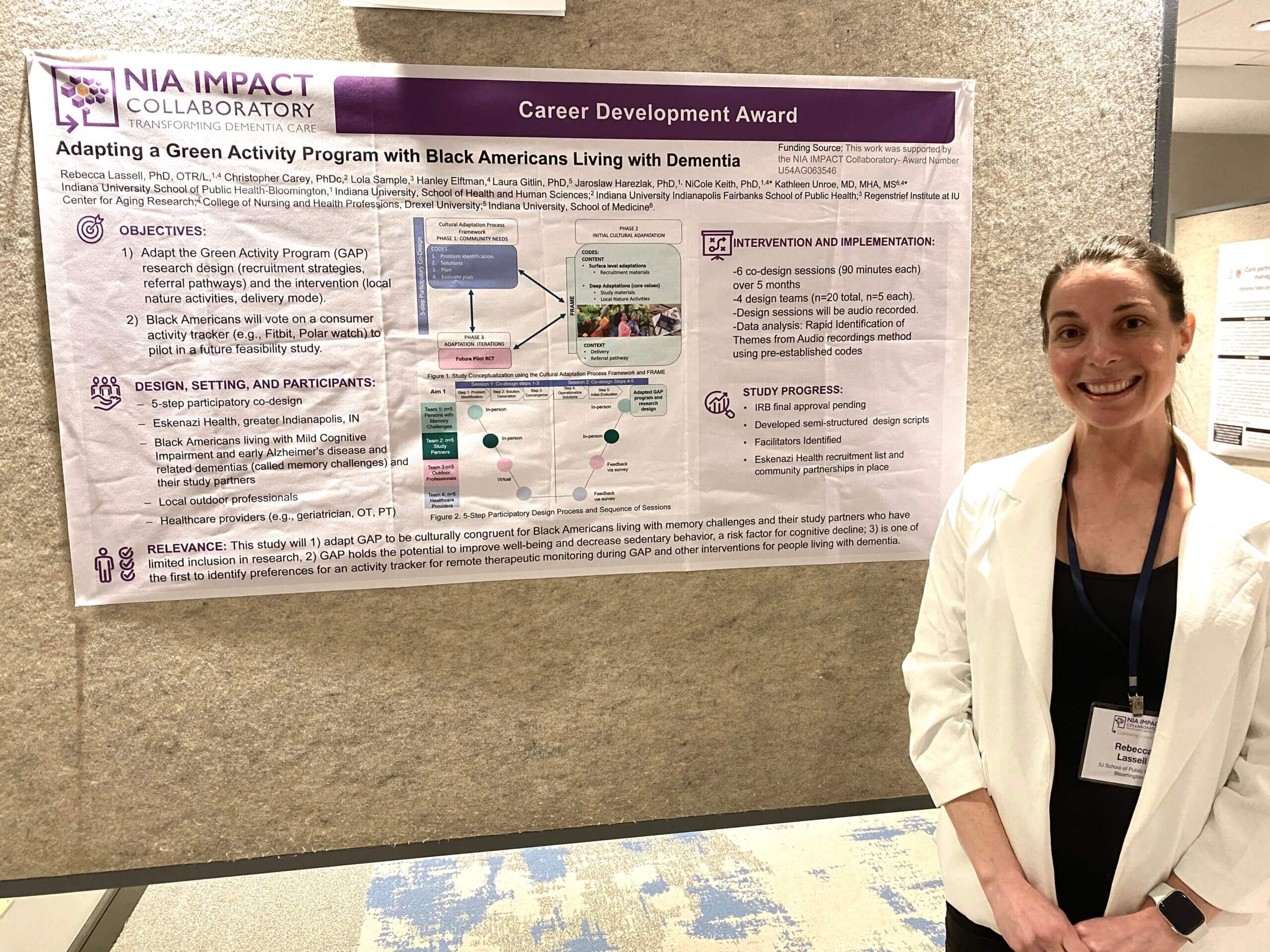Rebecca Lassell standing next to their poster at the 2024 IMPACT Conference