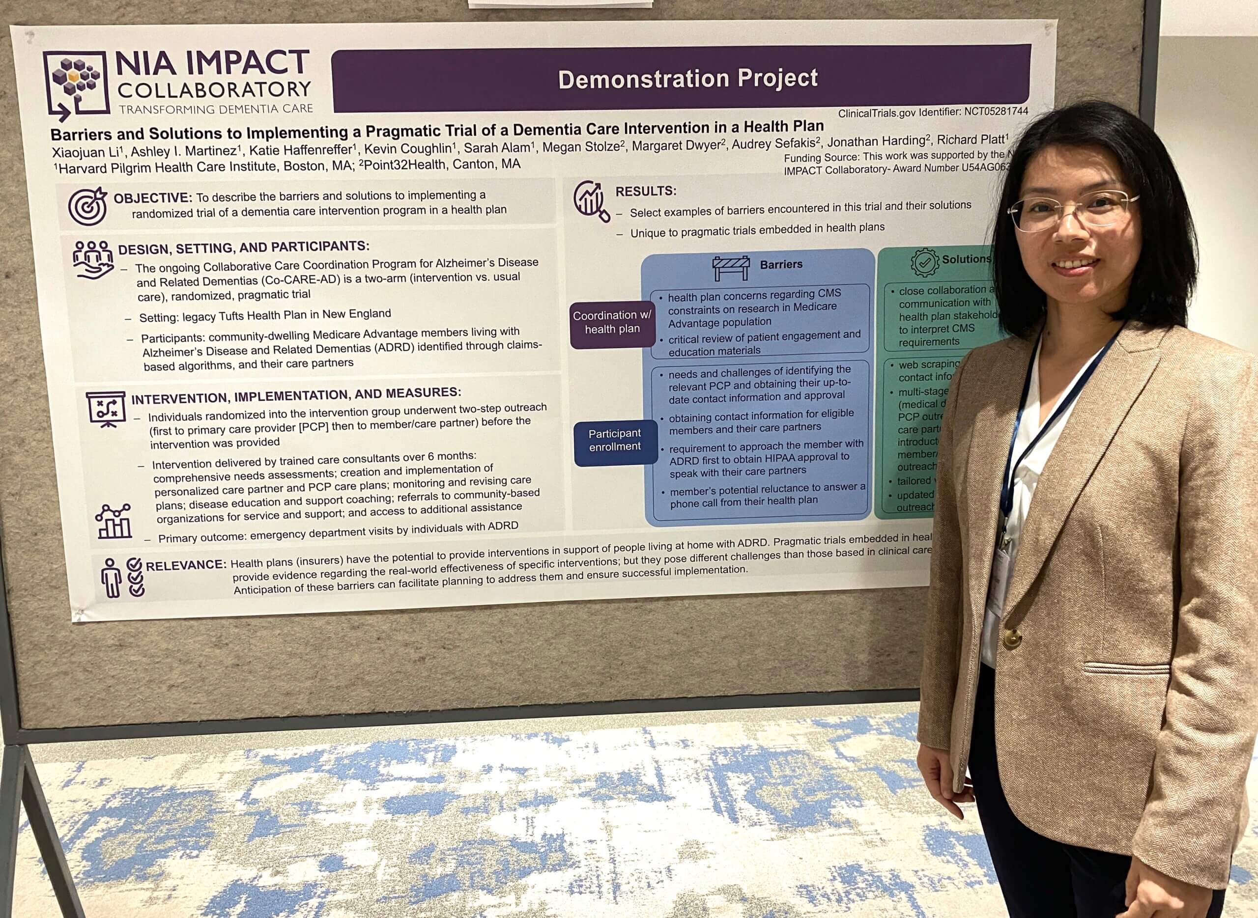 Xiaojuan Li standing next to their poster at the 2024 IMPACT Conference